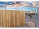 The backyard of this property is newly fenced with a wooden privacy fence at 6601 E Latham St, Scottsdale, AZ 85257