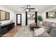 Inviting living room featuring modern furniture, wood floors, and a view to the outside at 6601 E Latham St, Scottsdale, AZ 85257