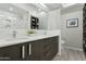 Modern bathroom with double sinks, stylish vanities, and a glass-enclosed shower at 7120 E Kierland Blvd # 601, Scottsdale, AZ 85254