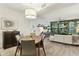 Bright living room with wood floors and comfortable seating, adjacent to the dining area and kitchen at 7120 E Kierland Blvd # 601, Scottsdale, AZ 85254