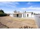 Expansive backyard featuring a covered patio, perfect for outdoor gatherings and activities at 713 E Eason Ave, Buckeye, AZ 85326