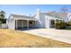 Charming home exterior with a covered carport and a well-manicured front yard at 713 E Eason Ave, Buckeye, AZ 85326