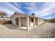 Backyard featuring a covered patio and xeriscape, perfect for outdoor enjoyment at 725 W Hermosa Dr, Wickenburg, AZ 85390