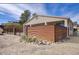 This backyard features a horizontal metal fence, gravel landscaping, and desert plants at 725 W Hermosa Dr, Wickenburg, AZ 85390