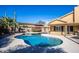 Backyard pool featuring a covered patio area, desert landscaping, and a clear blue sky at 7365 W Via Del Sol Dr, Glendale, AZ 85310