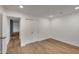 Bedroom with wood floors and a view of the hallway at 743 E Sierra Vista Dr, Phoenix, AZ 85014