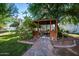 Beautiful gazebo area with seating, surrounded by trees and landscaping at 815 N Hayden Rd # B109, Scottsdale, AZ 85257