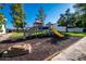 Community playground with a slide, climbing structure, and soft mulch ground cover at 815 N Hayden Rd # B109, Scottsdale, AZ 85257