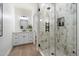 Bathroom with a glass enclosed tile shower, and marble counter at 8254 E Juan Tabo Rd, Scottsdale, AZ 85255