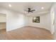 Bedroom featuring tile floors, a walk-in closet, and a desert view from the window at 8254 E Juan Tabo Rd, Scottsdale, AZ 85255