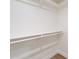 Walk-in closet featuring bright white shelving and closet rods at 8254 E Juan Tabo Rd, Scottsdale, AZ 85255