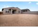 Spacious backyard awaiting your personal touch, with ample room for landscaping and outdoor living at 8555 W Trenton Ct, Florence, AZ 85132