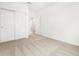 Carpeted bedroom featuring white walls and a closet with sliding doors at 8555 W Trenton Ct, Florence, AZ 85132