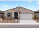 Inviting single-story home featuring a neutral color palette and a two-car garage in a desirable location at 8555 W Trenton Ct, Florence, AZ 85132