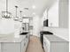 Open kitchen featuring a large island, modern appliances, and ample cabinet space for storage at 8555 W Trenton Ct, Florence, AZ 85132