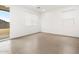 Open and airy living space with tile flooring and sliding glass door at 8555 W Trenton Ct, Florence, AZ 85132