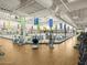 Community fitness center featuring weight and cardio equipment, hardwood floors and gymnasium views at 8560 W Trenton Ct, Florence, AZ 85132