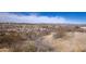 Scenic landscape shows a desert hillside with shrubs and views of distant mountains at 100 N Vulture Mine Rd # 103, Wickenburg, AZ 85390