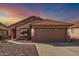 Charming single-story home featuring a tile roof, low-maintenance landscaping, and a two-car garage at 1146 N 89Th St, Mesa, AZ 85207