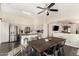 Open concept kitchen with stainless steel appliances, a center island, and dining area at 1146 N 89Th St, Mesa, AZ 85207