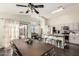 Bright kitchen with a large island, stainless steel appliances, and an adjacent dining area at 1146 N 89Th St, Mesa, AZ 85207