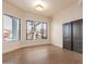 Bedroom features natural light, neutral walls, and hardwood floors at 11628 S Warcloud Ct, Phoenix, AZ 85044