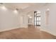 Bright foyer with an arched entryway and a view of the front door at 11628 S Warcloud Ct, Phoenix, AZ 85044