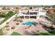 Aerial shot of the home and its backyard pool, stone accents, and desert landscaping at 11628 S Warcloud Ct, Phoenix, AZ 85044