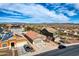 A panoramic view of the desert landscape and a well-maintained neighborhood with mountain views at 11954 W Melinda Ln, Sun City, AZ 85373