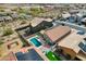 A peaceful backyard with a pool and desert landscaping, offering a private outdoor oasis at 11954 W Melinda Ln, Sun City, AZ 85373