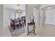 Inviting dining area with stylish seating and natural light filtering through the blinds at 11954 W Melinda Ln, Sun City, AZ 85373