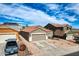 Charming single-story home featuring a two-car garage and desert landscaping for low maintenance at 11954 W Melinda Ln, Sun City, AZ 85373