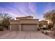 Three-car garage of a modern home with neutral color palette at 12026 N 138Th St, Scottsdale, AZ 85259