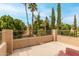 Balcony with views of lush tropical landscaping and trees at 13566 N 93Rd Pl, Scottsdale, AZ 85260