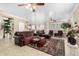 Spacious living room featuring neutral color palette and views to the kitchen at 13566 N 93Rd Pl, Scottsdale, AZ 85260