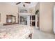 Main bedroom featuring high ceilings, a four-poster bed, and plenty of natural light at 13566 N 93Rd Pl, Scottsdale, AZ 85260