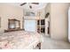 Main bedroom featuring high ceilings and neutral walls at 13566 N 93Rd Pl, Scottsdale, AZ 85260