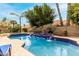 Inviting pool featuring decorative waterfall features and lush landscaping at 13566 N 93Rd Pl, Scottsdale, AZ 85260