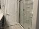 Bathroom showcasing walk-in shower and white door at 1367 S Country Club Dr # 1315, Mesa, AZ 85210