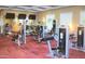 Well-equipped fitness center with modern machines, weights, and multiple TV screens at 1367 S Country Club Dr # 1315, Mesa, AZ 85210