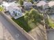 Aerial view of a backyard featuring a large grassy area and privacy wall at 1447 S Portland Ave, Gilbert, AZ 85296