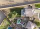 An aerial view of a home with a private backyard oasis and desert landscaping at 1447 S Portland Ave, Gilbert, AZ 85296