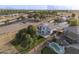 Aerial view of a home with a backyard oasis and desert landscaping at 1447 S Portland Ave, Gilbert, AZ 85296