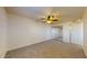 Spacious bedroom with neutral carpet and a ceiling fan at 1645 W Baseline Rd # 2050, Mesa, AZ 85202