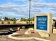 Water Works Condominiums sign at 1645, surrounded by rock features and desert plants at 1645 W Baseline Rd # 2050, Mesa, AZ 85202