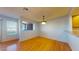 Dining area with natural light, neutral walls, and a passthrough looking into the kitchen at 1645 W Baseline Rd # 2050, Mesa, AZ 85202