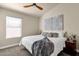 Serene bedroom with plush bedding, natural light, and stylish decor at 16808 N 59Th Pl, Scottsdale, AZ 85254