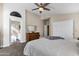 Cozy main bedroom featuring an ensuite bathroom and walk-in closet at 16808 N 59Th Pl, Scottsdale, AZ 85254