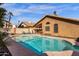 Backyard features a private pool with adjacent covered patio and home at 16808 N 59Th Pl, Scottsdale, AZ 85254