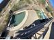 Stunning aerial view of a beautiful pool with a waterfall and an outdoor seating area at 17012 S 27Th Ln, Phoenix, AZ 85045